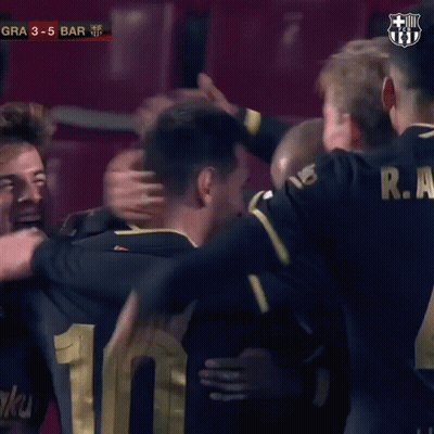 Man In FC Barcelona Jersey Hugging Another Man GIF