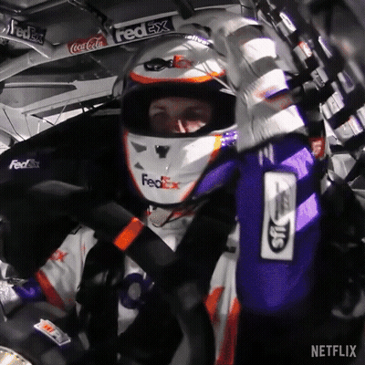 Man In FedEx Helmet Sitting In Race Car GIF