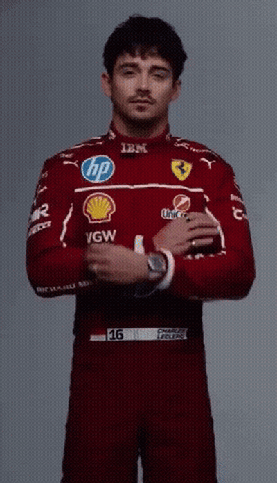 Man In Ferrari Uniform Adjusting Watch GIF