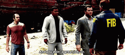 Man In FIB Jacket Talking To Group Of Men GIF