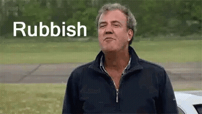 Man In Field With Car And Rubbish On Face GIF