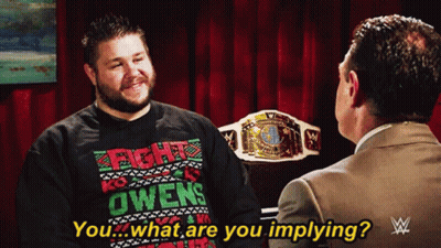 Man In Fight Owens Sweater Talking To Another GIF
