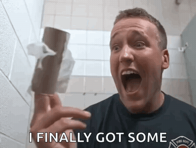 Man In Fire Dept Shirt Holding Toilet Paper Saying I Finally Got Some GIF