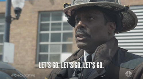 Man In Fireman Uniform Says Let's Go GIF