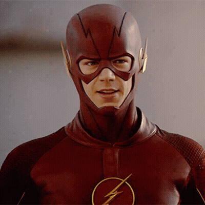 Man In Flash Costume With Lightning Bolt GIF