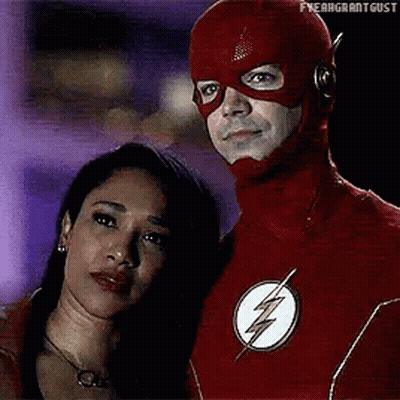 Man In Flash Suit Next To Woman GIF