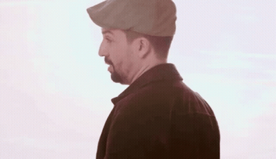 Man in Flat Cap and Black Jacket