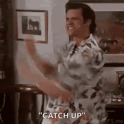 Man In Floral Shirt Dancing Holding Framed Picture GIF