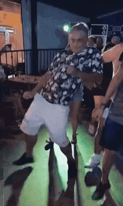 Man in Floral Shirt Dancing