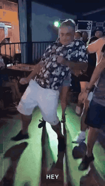 Man In Floral Shirt Dancing GIF