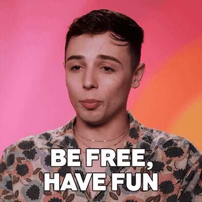 Man In Floral Shirt Saying Be Free Have Fun GIF
