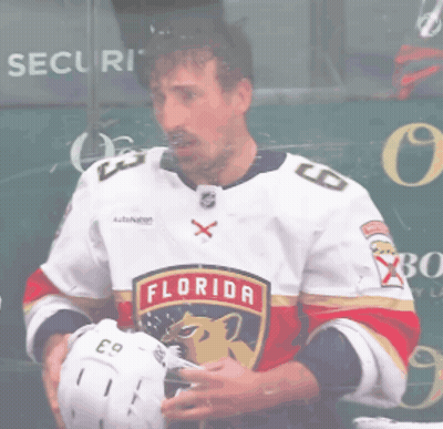 Man In Florida Hockey Jersey Holding Helmet GIF