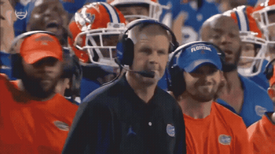 Man In Florida Shirt And Headphones Watching Football GIF