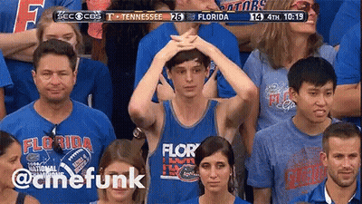 Man In Florida Shirt Holding Head GIF