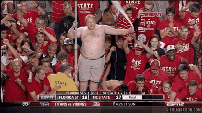 Man In Florida State Shirt Holding Bat In Crowd GIF