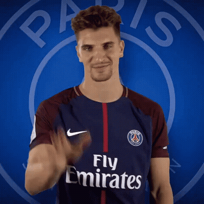 Man In Fly Emirates Shirt Waving GIF