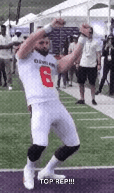 Man In Football Uniform Dancing On Field GIF