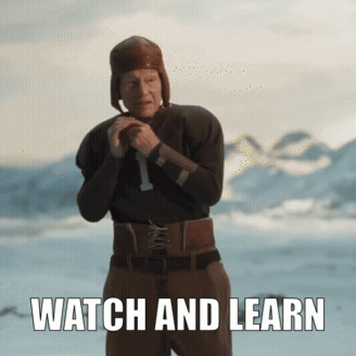 Man In Football Uniform Standing In Snow Saying Watch And Learn GIF