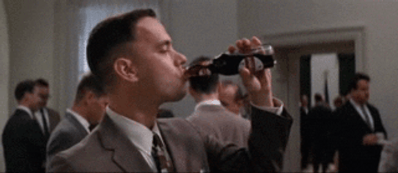 Man In Formal Attire Drinking Dr Pepper GIF