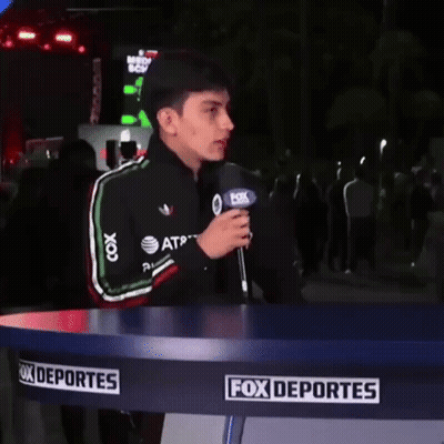 Man In Fox Deportes Jacket Holding Microphone GIF