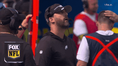Man In Fox NFL Shirt On Sidelines GIF