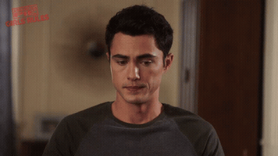 Man In Front Of American Psycho Girls Rule Sign GIF