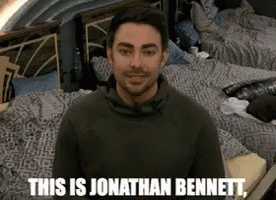 Man In Front Of Bed Saying This Is Jonathan Bennett GIF