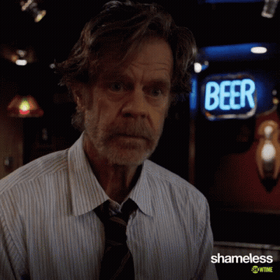 Man In Front Of Beer Sign GIF