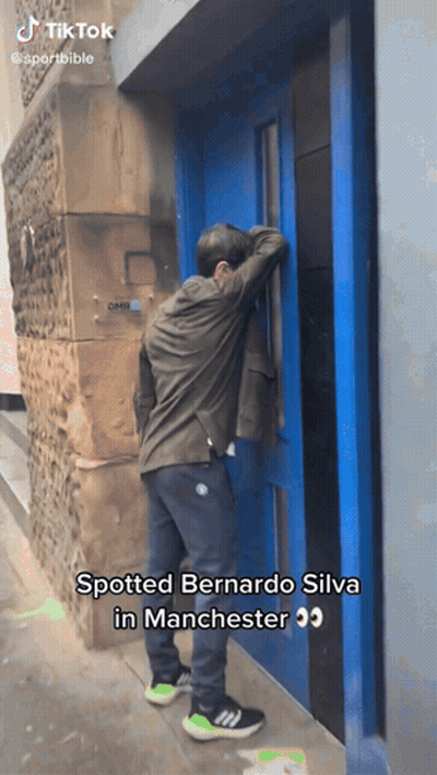 Man In Front Of Blue Door Saying Spotted Bernardo Silva In Manchester GIF