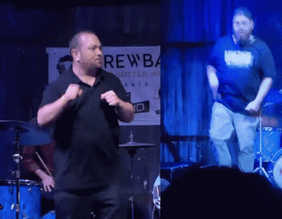 Man In Front Of Brewba Butter Banner GIF