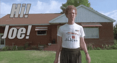 Man In Front Of Brick House Hi Joe GIF