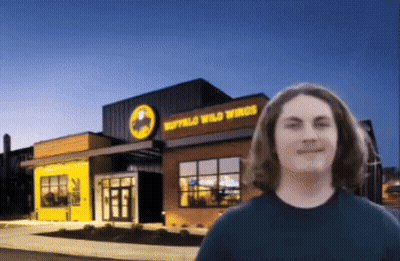 Man In Front Of Buffalo Wild Wings GIF