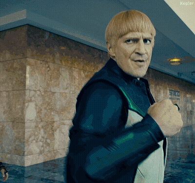 Man In Front Of Building With Kepler Sign GIF