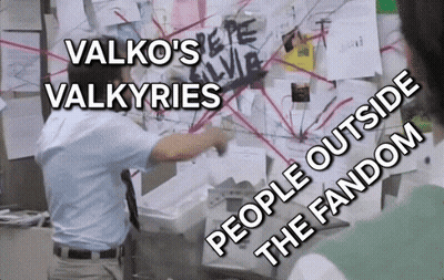 Man In Front Of Bulletin Board Saying Valkos Valkyries GIF