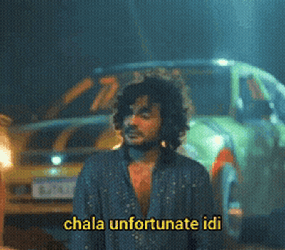 Man In Front Of Car Saying Chala Unfortunate Idi GIF