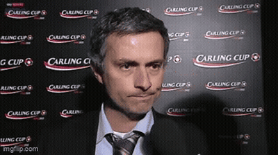 Man In Front Of Carling Cup Wall GIF