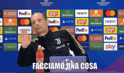 Man In Front Of Champions League Ad GIF