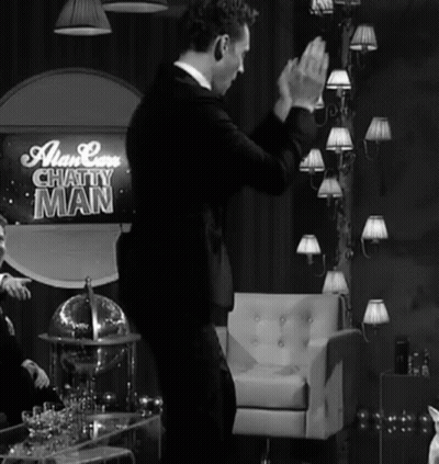 Man In Front Of Chatty Man Sign GIF
