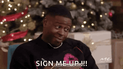 Man In Front Of Christmas Tree Saying Sign Me Up GIF