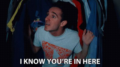 Man In Front Of Closet Saying I Know You're In Here GIF