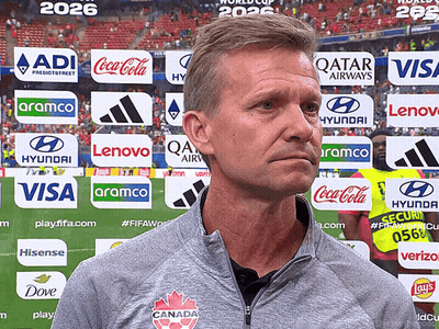 Man In Front Of Coca Cola And Visa Advertisements GIF