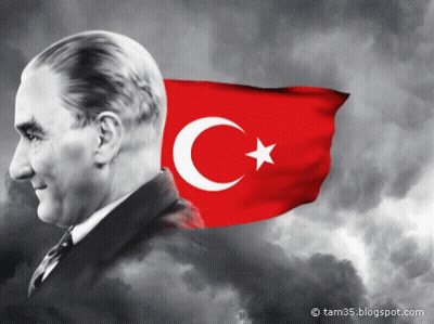 Man In Front Of Crescent Moon And Star Flag GIF