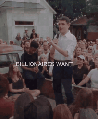 Man In Front Of Crowd Saying Billionaires Want Us GIF