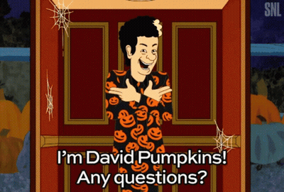 Man in Front of Door Saying I'm David Pumpkins Any Questions