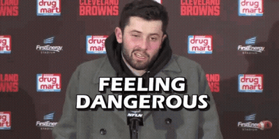 Man In Front Of Drug Mart Wall GIF
