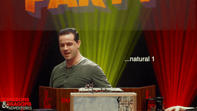 Man In Front Of Dungeons & Dragons Adventures Sign GIF