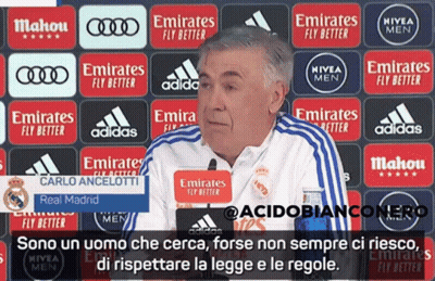 Man In Front Of Emirates Advertisements GIF