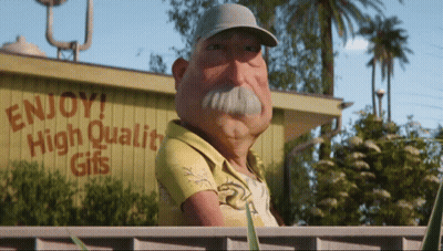 Man In Front Of Enjoy High Quality Gifts Sign GIF