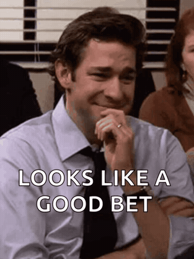Man In Front Of Enjoy High Quality Gifts Sign GIF