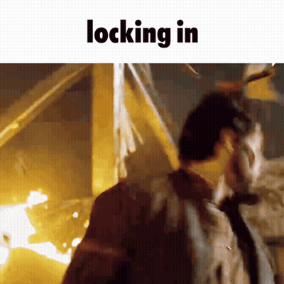 Man In Front Of Fire Saying Locking In GIF